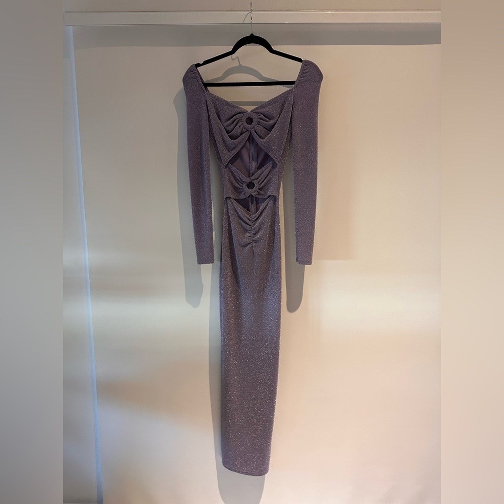 This dress fits super cute. Perfect for a night out.